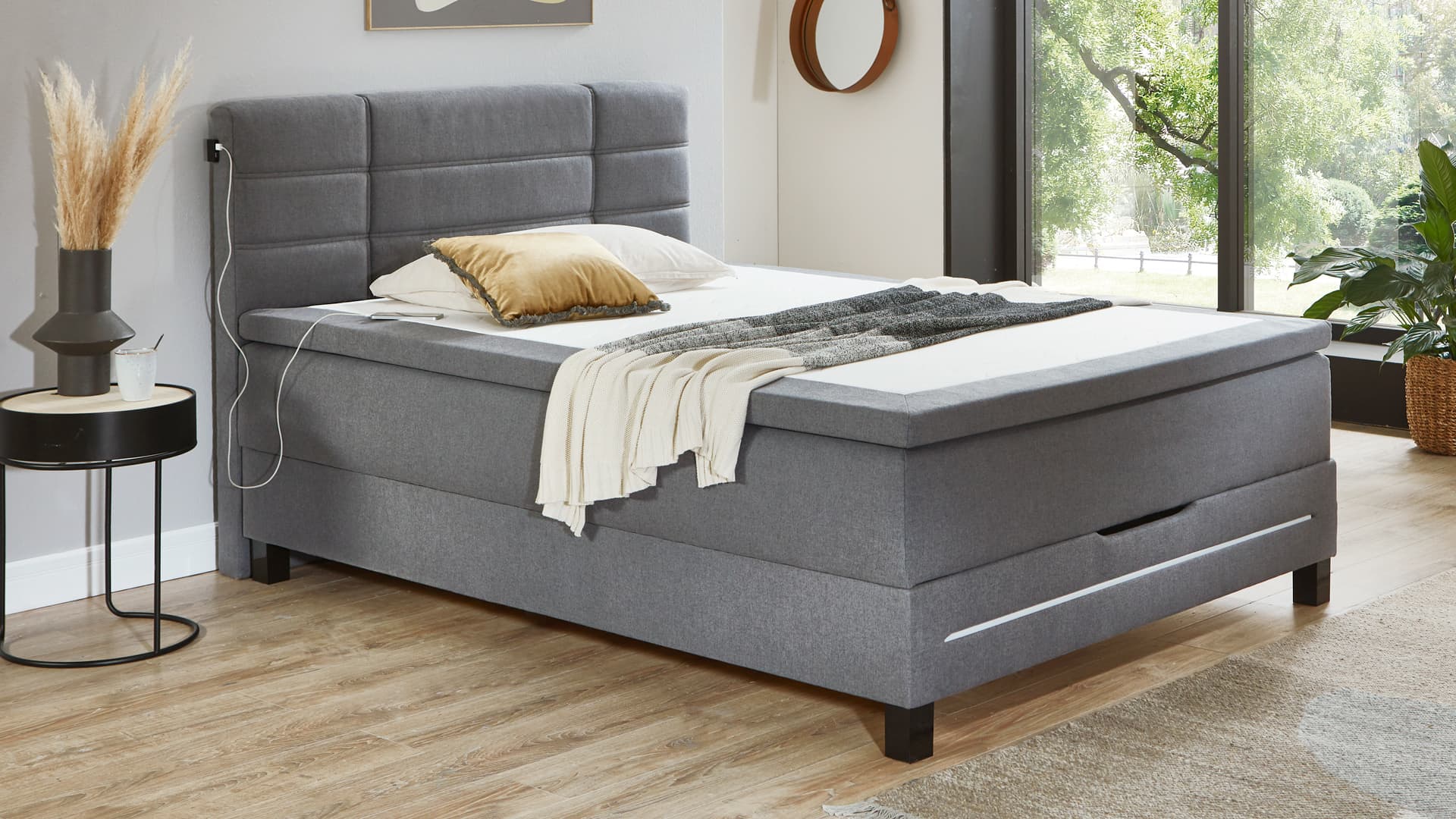 boxspringbett in grau mit led beleuchtung und usb anschluss imkopfteil