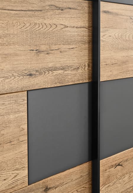 schiebetuer in holzoptik mit graphitfarbenen akzenten