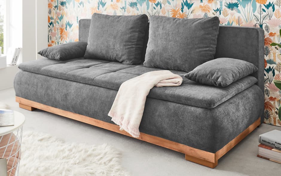 stylisches schlafsofa in grau mit holzfuss und grosszuegiger polsterung